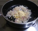A picture of step 1 of Paneer bhurji (gravy form) with bun.