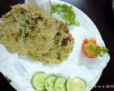A picture of step 5 of Kachha Aam akki roti.