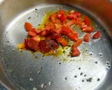 A picture of step 2 of Moong-Urad dal Curry.