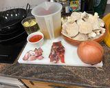 Foto del paso 1 de la receta: Setas de cultivo a ajillo con jamón y salsa con huevo poché