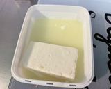 Une image de l'étape 5 de Salade de concombre à la crème, oignon doux, feta et coriandre.