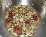 A picture of step 3 of Raw mango,garlic pickle.
