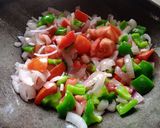 A picture of step 3 of Paneer, Onion and Capsicum sabzi.