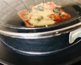 A picture of step 5 of Bread Pizza.
