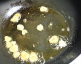 A picture of step 1 of Spring Onion Soup.