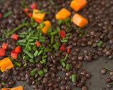 A picture of step 3 of Smoked tofu with a puy lentils and warm chilli salad.