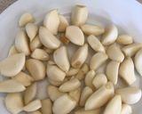 A picture of step 3 of Garlic, preserved in White Wine Vinegar.