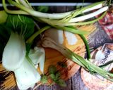 A picture of step 2 of Shrimp Rice Noodles with stir fried vegetables.