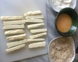 A picture of step 2 of Baked halloumi fries.