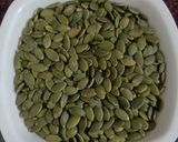 A picture of step 1 of Masala Roasted Pumpkin Seeds.