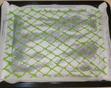 A picture of step 4 of Kiwi swiss roll cake.