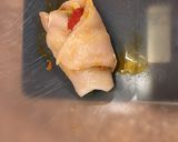 A picture of step 6 of Chicken rollatini.