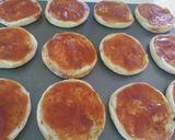 Foto del paso 3 de la receta: Mini pizzas de piña, jamón y queso