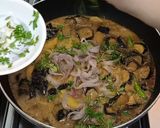 A picture of step 8 of Fried Aloo Baingan.