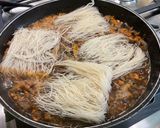 Une image de l'étape 11 de Nouilles de riz sautées aux légumes et épices.