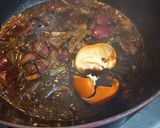 A picture of step 5 of Hong Kong Chicken with light and dark Soy Sauce.