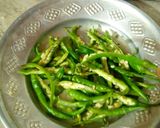 A picture of step 2 of Pan Fried crunchy Chillies by Nancy.