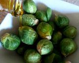 A picture of step 1 of My Roasted Sprouts in orange,crushed Walnuts and Cranberry sauce.