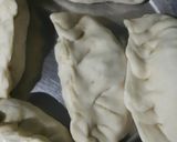 A picture of step 11 of Schezwan Noodle Momos.