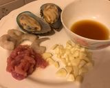 A picture of step 1 of Super Healthy Cellophane noodles with shrimps mussels pork fried vegetables.
