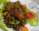 A picture of step 3 of Karelay Gosht. and Roti.