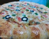 A picture of step 3 of Corners Cheese filled pizza.