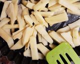 Foto del paso 2 de la receta: Papas fritas al horno con romero y jengibre
