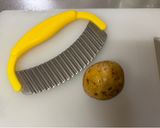 A picture of step 1 of Fried Potatoes with cheese and Japanese sauce.