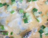 A picture of step 2 of Quick asparagus, spring onion and cheddar omlette.
