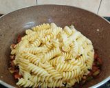 A picture of step 10 of Indian Style Veggies Pasta.