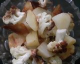 A picture of step 2 of Aloo gobi mutter tehri.