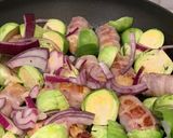 A picture of step 1 of Pig in Blankets and Brussel sprouts with sweet plum sauce.