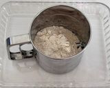 A picture of step 2 of Healthy Atta Jaggery Muffins in Appe Pan.