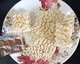 A picture of step 3 of Maggi soup.