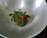 A picture of step 2 of Sweet & Sour Raw Mango & Jaggery.