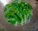 A picture of step 1 of Masala Bhindi.