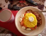 A picture of step 5 of Miyar kayanciki da shinkafa Mai curry.