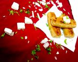 A picture of step 6 of Paneer Paratha Roll.