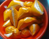 A picture of step 7 of Moi-moi with pepper and spring onion sauce.
