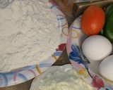 A picture of step 1 of Mini pizza with speghetti.