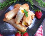 Foto langkah ke 4 dari resep Pisang Coklat Keju Roti Tawar.