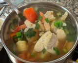 A picture of step 4 of Cambodian fish and pineapple soup.