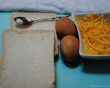 A picture of step 13 of Eggs in bread basket.