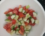 A picture of step 1 of Italian rustic cucumber and tomato salad.