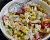 A picture of step 5 of Greek salad with ranch dressing.