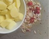 A picture of step 5 of Meethi Alo.