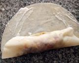 A picture of step 14 of Pastry spring rolls.