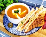 A picture of step 7 of Restaurant Style Classic Tomato Soup and Grilled Cheese Sandwich.