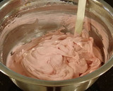 A picture of step 6 of Whipped White Chocolate Raspberry Ganache Frosting and Filling.