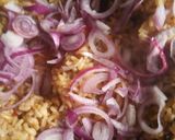 A picture of step 14 of Jollof rice and pomo.